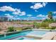 Gorgeous pool and spa with stunning views of the desert landscape, perfect for a refreshing dip on a hot day at 9233 Canyon Mesa Dr, Las Vegas, NV 89144