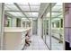 Spacious bathroom featuring a vanity, mirrored walls, and tile flooring at 940 Vegas Valley Dr, Las Vegas, NV 89109