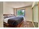 A bright bedroom features a sliding glass door and a view of the outdoors at 940 Vegas Valley Dr, Las Vegas, NV 89109