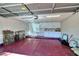 A well-lit garage with ample storage space, featuring a variety of stained glass decoratives at 940 Vegas Valley Dr, Las Vegas, NV 89109