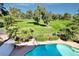 Scenic view of the golf course and verdant trees from the patio of this property at 940 Vegas Valley Dr, Las Vegas, NV 89109
