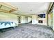 Large main bedroom featuring a fireplace, sliding doors, and an adjacent bathroom space at 940 Vegas Valley Dr, Las Vegas, NV 89109