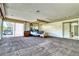Spacious carpeted main bedroom with attached bathroom and outside deck access via sliding door at 940 Vegas Valley Dr, Las Vegas, NV 89109