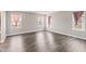 Bright, open bedroom featuring three windows for lots of natural light at 10058 Matter Overlook Dr, Las Vegas, NV 89178