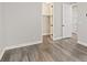 A bright bedroom with sleek flooring and a walk-in closet at 10058 Matter Overlook Dr, Las Vegas, NV 89178