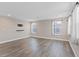 A roomy living room area with luxury vinyl floors and bright natural light at 10058 Matter Overlook Dr, Las Vegas, NV 89178