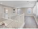 A spacious living room area with lots of natural light and vinyl flooring at 10058 Matter Overlook Dr, Las Vegas, NV 89178