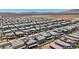 Wide aerial view of a community showcasing many single Gathering homes with various roof types at 10058 Matter Overlook Dr, Las Vegas, NV 89178