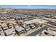 Aerial view of a neighborhood featuring the gray roof of a home with solar panels at 10058 Matter Overlook Dr, Las Vegas, NV 89178