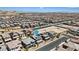 Aerial view of a neighborhood featuring the gray roof of a home with solar panels at 10058 Matter Overlook Dr, Las Vegas, NV 89178