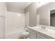Bathroom featuring a bathtub and shower combination, vanity with a sink, and a toilet at 1125 Lumina Ct, Las Vegas, NV 89117