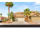 Charming two-story home featuring a tile roof, well-kept landscaping, and a spacious two-car garage at 1125 Lumina Ct, Las Vegas, NV 89117