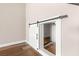 Unique under stairs storage space with sliding barn door and open access at 1125 Lumina Ct, Las Vegas, NV 89117
