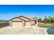 Stunning single-story home featuring a three-car garage and low-maintenance landscaping at 1204 Golf Club, Laughlin, NV 89029