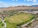 This community park features a soccer field, playground and walking trails with mountain views at 12415 Notch Trail Ave, Las Vegas, NV 89138