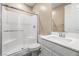 Clean and modern bathroom featuring a glass-enclosed shower, a white vanity, and neutral decor at 12415 Notch Trail Ave, Las Vegas, NV 89138