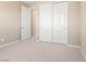 Bedroom with neutral carpet and closet space at 12415 Notch Trail Ave, Las Vegas, NV 89138