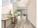 Bright foyer with wood floors leading to an open-concept living space with mountain views at 12415 Notch Trail Ave, Las Vegas, NV 89138