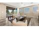 Living room highlights a sliding glass door and plush sectional sofa at 12415 Notch Trail Ave, Las Vegas, NV 89138