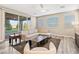 Living room boasts ample natural light and sliding glass door entry to backyard at 12415 Notch Trail Ave, Las Vegas, NV 89138