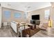 Living room features recessed lighting, a ceiling fan, and views of the neighborhood at 12415 Notch Trail Ave, Las Vegas, NV 89138