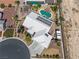 Aerial view of the property, highlighting the tile roof, solar panels, pool, and landscaping at 231 Bristle Cone, Pahrump, NV 89048