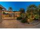 Backyard patio area features built in BBQ, mature landscaping and pavers at 231 Bristle Cone, Pahrump, NV 89048