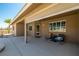 Relaxing covered backyard patio with comfortable seating, perfect for outdoor entertaining at 231 Bristle Cone, Pahrump, NV 89048