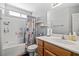 Well-lit bathroom with a tub, shower, and large vanity at 231 Bristle Cone, Pahrump, NV 89048