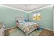 Bedroom with a window and a ceiling fan with lights at 231 Bristle Cone, Pahrump, NV 89048