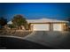 Charming single-story home with well-maintained landscaping and a three-car garage at 231 Bristle Cone, Pahrump, NV 89048