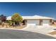 Charming single-story home with well-maintained landscaping and a three-car garage at 231 Bristle Cone, Pahrump, NV 89048