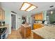 Stylish kitchen featuring a central island, modern appliances, and ample counter space at 231 Bristle Cone, Pahrump, NV 89048