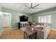 Comfortable living room with a large sectional sofa and a ceiling fan at 231 Bristle Cone, Pahrump, NV 89048