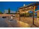 Custom outdoor kitchen with a built-in grill and countertop space, great for outdoor cooking at 231 Bristle Cone, Pahrump, NV 89048