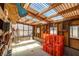 Inside the shed there are some storage shelves and work lights at 231 Bristle Cone, Pahrump, NV 89048