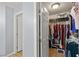 Bright, organized walk-in closet with shelving and ample storage space at 231 Bristle Cone, Pahrump, NV 89048