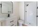 Updated bathroom featuring new vanity, shower, toilet, and modern fixtures at 2724 Natalie Ave, Las Vegas, NV 89121