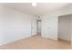 Bedroom featuring light wood floors, and closets with sliding doors and neutral walls at 2724 Natalie Ave, Las Vegas, NV 89121