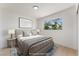 Cozy bedroom with large window offering scenic outdoor views at 2724 Natalie Ave, Las Vegas, NV 89121