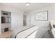Bedroom featuring a comfortable bed, closet, and stylish decor, virtually staged at 2724 Natalie Ave, Las Vegas, NV 89121