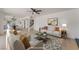 Open living space showcasing modern furniture, light-colored floors, and seamless flow into the dining area at 2724 Natalie Ave, Las Vegas, NV 89121