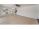 Spacious open-concept living area with light floors, open access to kitchen and plenty of natural light at 2724 Natalie Ave, Las Vegas, NV 89121