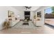 Light filled living room with modern furniture, a black fireplace and access to the back yard at 2724 Natalie Ave, Las Vegas, NV 89121