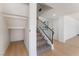 Staircase with carpet runner and black wrought iron railing at 2724 Natalie Ave, Las Vegas, NV 89121
