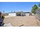 View of home's backyard, featuring desert landscaping and brick walls at 335 W Basic Rd, Henderson, NV 89015