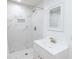 Bathroom features a modern sink, marble tiling, and a sleek shower at 335 W Basic Rd, Henderson, NV 89015