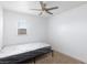 Cozy bedroom features a fan and a window with natural light at 335 W Basic Rd, Henderson, NV 89015
