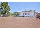 Single story home featuring desert landscaping at 335 W Basic Rd, Henderson, NV 89015