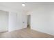 A bedroom with neutral paint, closet, and light wood floors for a clean, spacious feel at 343 W Basic Rd, Henderson, NV 89015